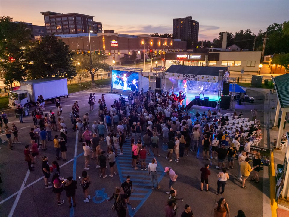 Royal Oak Pride festival crowd and illuminated stage at night